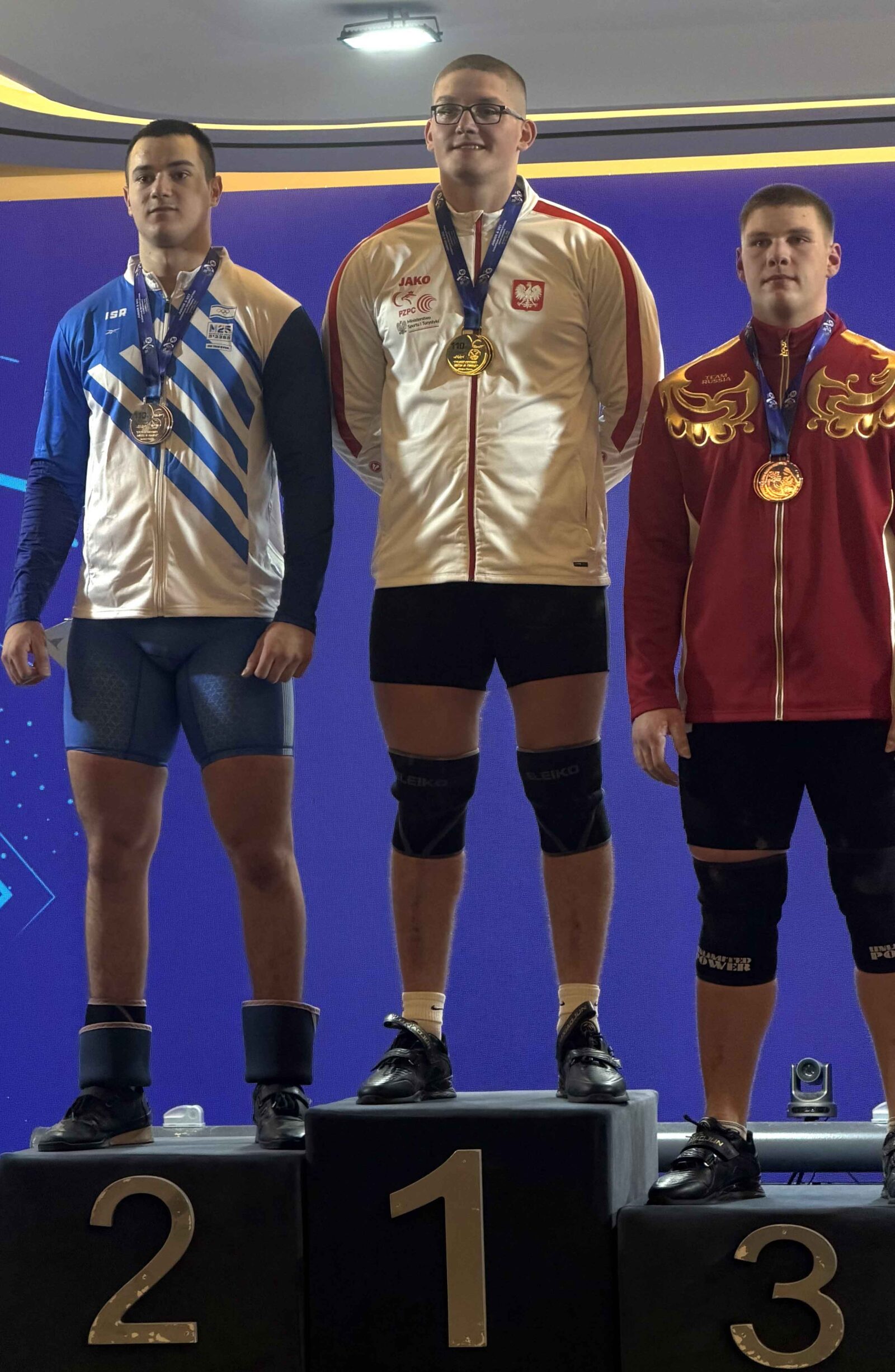 יאן מרגוליס על פודיום. צילום: איגוד הרמת המשקולות הישראלי